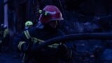 Ukraine -- Rescue workers at the site of Russian strike, Kyiv, 7Apr2025